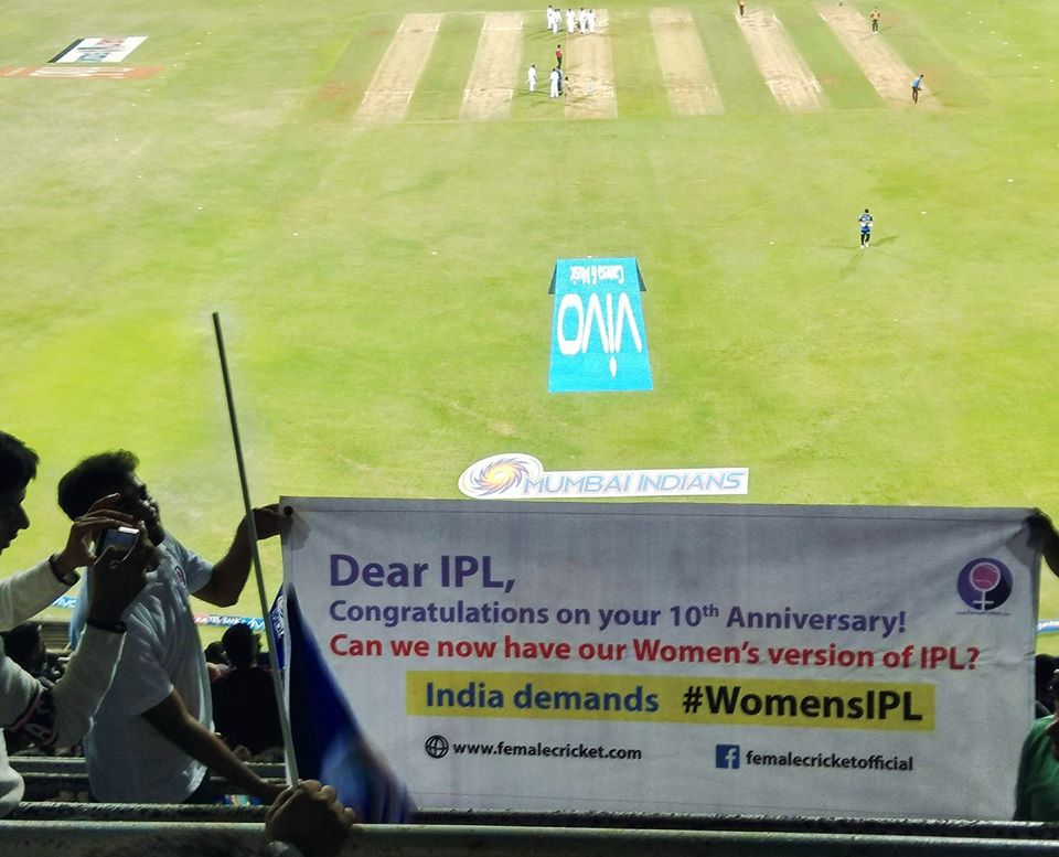 female cricket supporting women's IPL