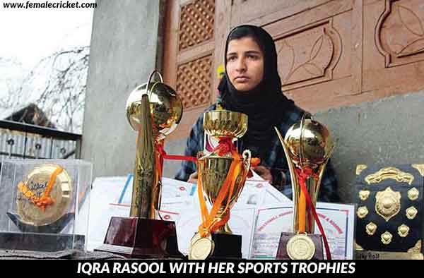 Iqra Rasool posing with her trophies