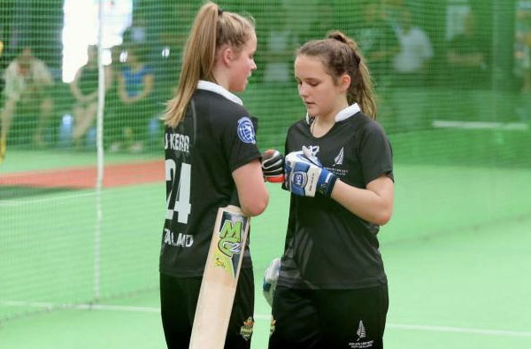 Tawa College sisters Jess and Amelia Kerr bat together for the New Zealand under-18 women's indoor cricket team during the recent World Cup in Australia.