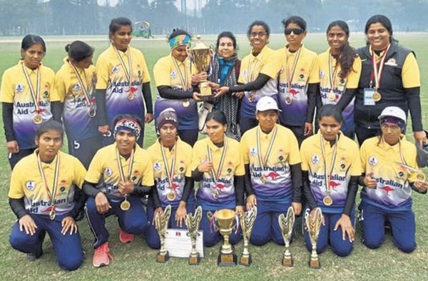 The Karnataka blind women’s cricket team with the runners-up trophy in Delhi (Photo: Samarthanam trust for the disabled)