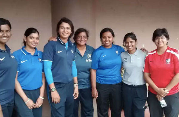 The women-in-charge: (from L-R) physiotherapists Tracy Fernandes and Prachi Lotlikar; coaches Devieka Palshikaar and Purnima Rau; video analyst Aarti Nalge, SnC Abhilasha Sharma and bowling coach Suman Sharma. © Cricbuzz