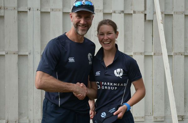 Katie McGill is presented with her 50th Scotland cap by coach Steve Knox (Picture James Bryce)