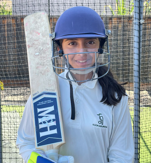 A Female Cricketer using Tektor Shields on her Helmet