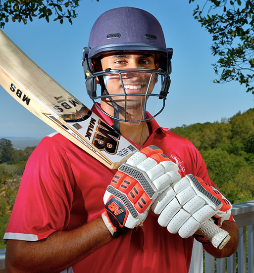 A Male Cricketer using Tektor Shields on her Helmet
