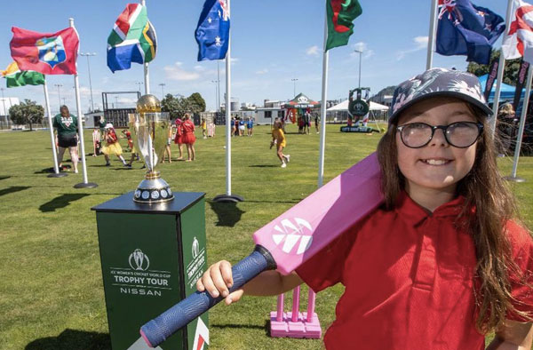 Thornton School's Ava Costello, 9, with the ICC Women's World Cup Trophy at the Rainbow Festival cricket day at Bay Oval in Mount Maunganui. Photo / Jamie Troughton