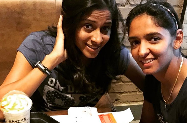 Harmanpreet Kaur with her friend Kavita Patil