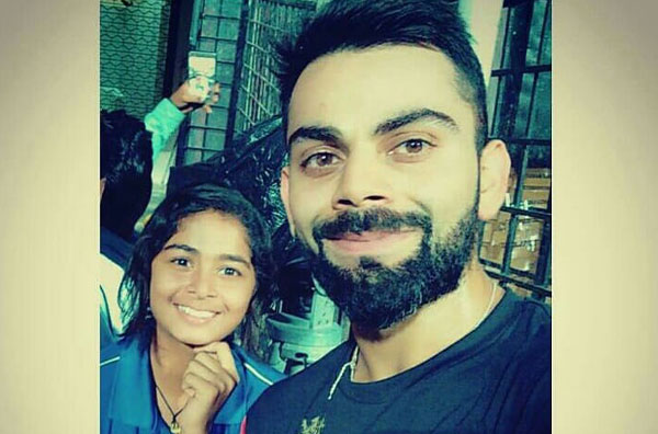 Shreyanka Patil with her idol - Virat Kohli