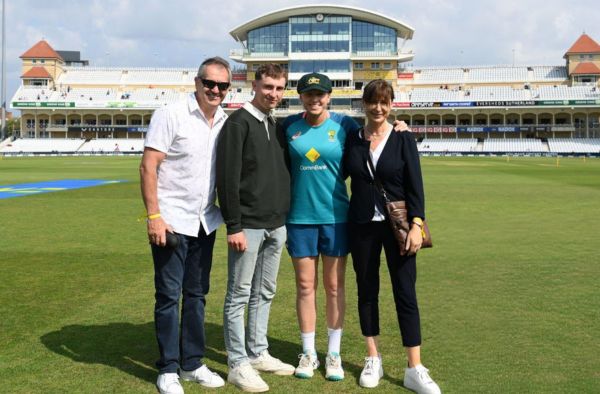 Kim Garth poses with her family on receiving Test cap