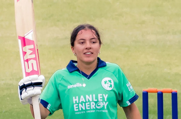Amy Hunter of Ireland celebrates hitting her maiden century aged 16